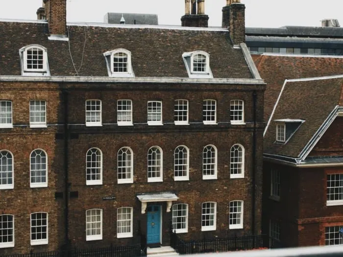 White timber sash windows on a Georgian brick terrace