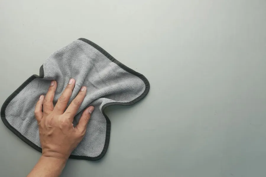 Wiping timber joinery with a soft microfibre cloth, the safest way to clean it
