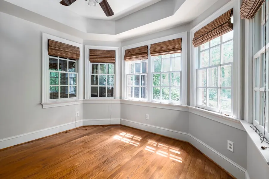 Empty bay-windowed room in a Torbay property left unheated between lettings