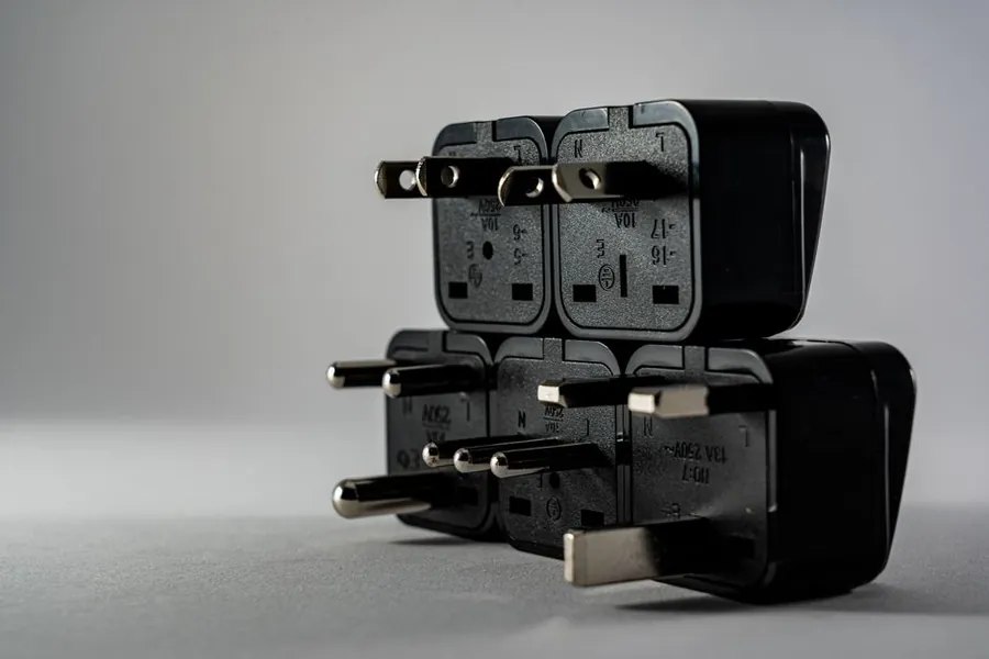 UK three-pin plug fittings, the kind of electrical work a fitted home office needs routed into the cabinet rather than trailing across the floor