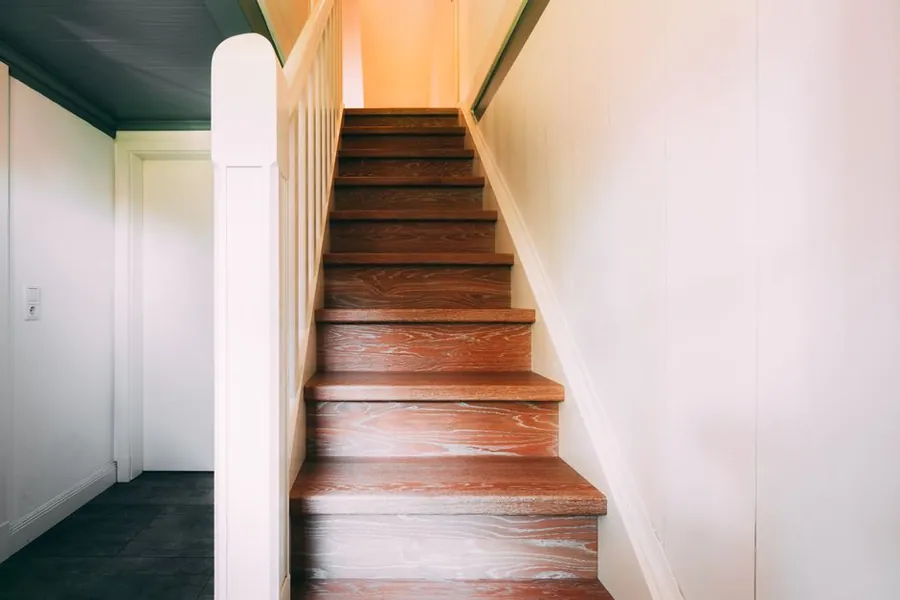 Compliant timber staircase flight in a home, set out to Approved Document K