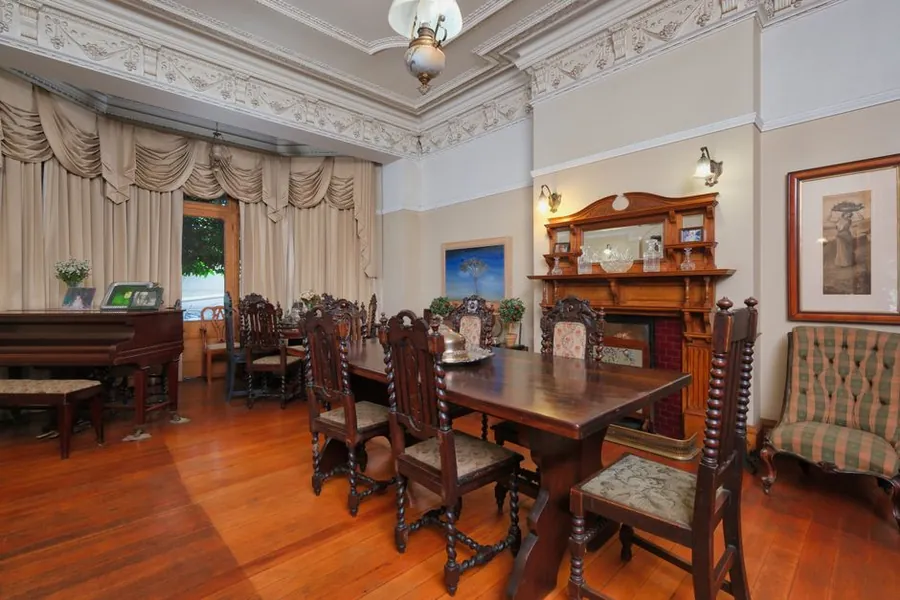 Ornate period cornice and fireplace of the kind found in Torquay's Victorian and Edwardian bedrooms