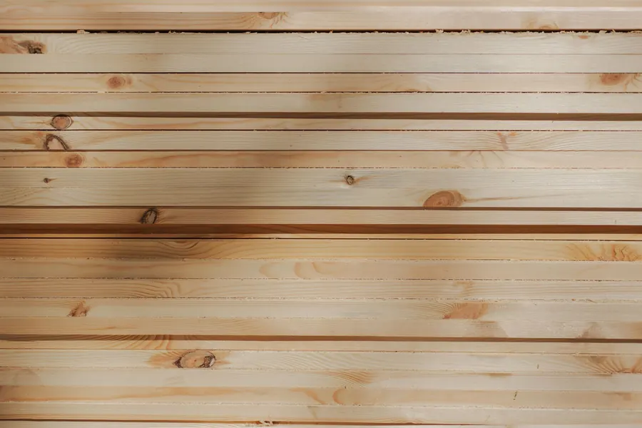 Planed softwood tongue-and-groove boards laid side by side, the material we use for beadboard and boarded wainscot in Torquay homes