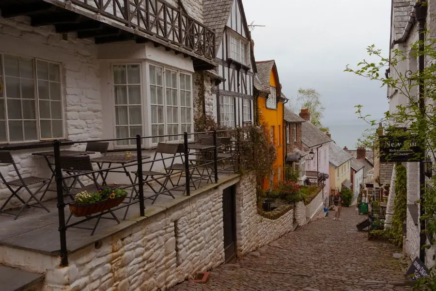Steep cobbled Devon street with houses on either side, the sort of access that decides how bespoke furniture has to be split into sections