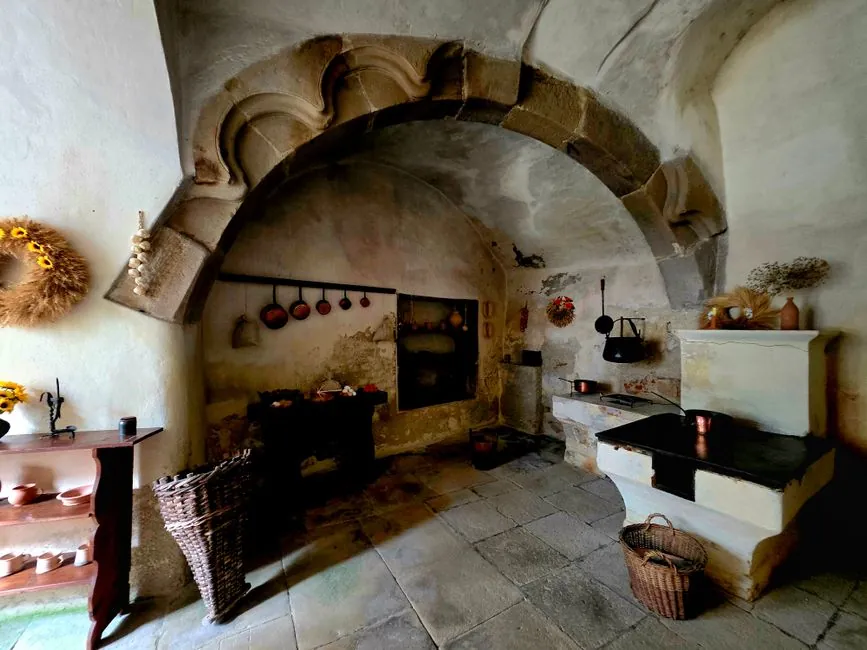Older kitchen with a chimney breast and hearth, the kind of room a bespoke kitchen is built around in Torquay