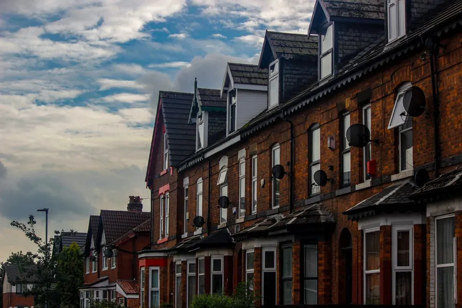 Solid brick walls of older terraced houses, the kind of external wall a fitted wardrobe needs designing around